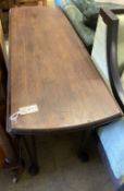 A George III oval mahogany drop leaf pad foot dining table, 142cm extended, width 122cm, height 71cm