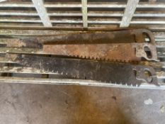 Three vintage hand saws, largest 120cm