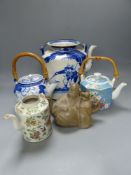 Five Chinese teapots, tallest 22cm