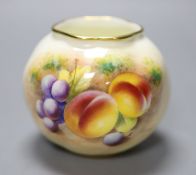 A Royal Worcester spirally moulded globular vase painted with fruits by Roberts, date code for 1955,