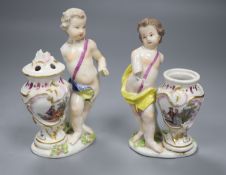 A pair of 18th century Meissen figures of putti and vases, height 14cmCONDITION: Youth wearing