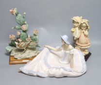 Two G Armani porcelain sculptures and a Nao figure of a lady