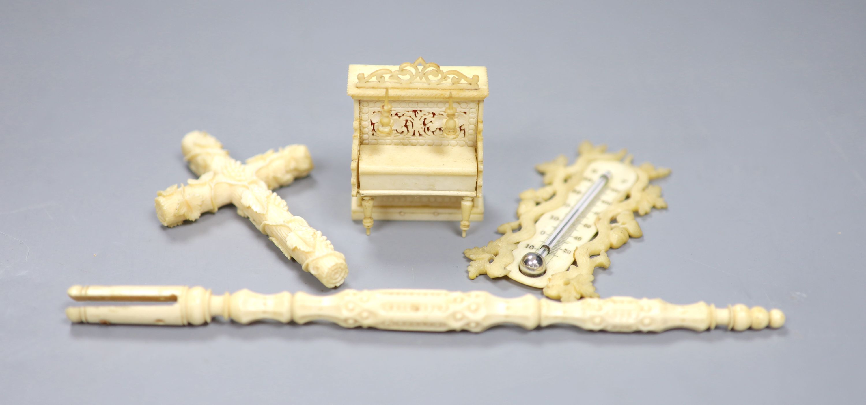 A group of decorative ivory and bone objects to include a 19th century Anglo-Indian carved bone