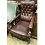 An early Victorian burgundy leather library chair, width 68cm, depth 80cm, height 98cm