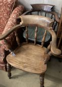 A Victorian smoker's bow chair and a similar later chair