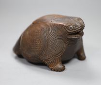 Ethnographica - a hardwood 'toad' box and cover, 14cm long, metal ring inset eyes, warm brown