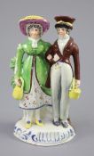 A Staffordshire pearlware group of a Dandy and Dandizette, c.1820-30, height 17cmCONDITION: