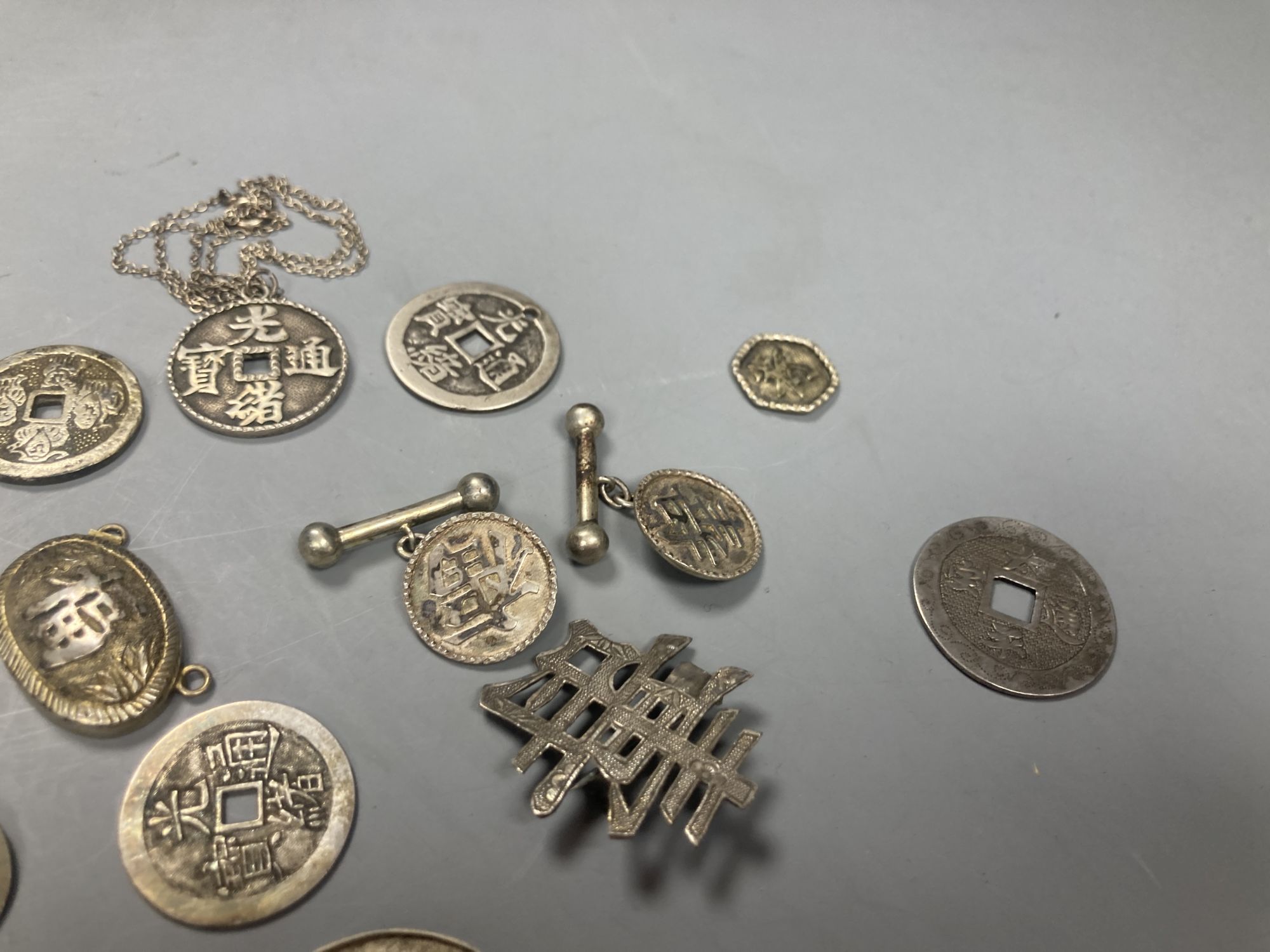 China, a group of silver and white metal coin charms, brooches and cuff links, Guangxu to Republic - Image 5 of 5