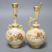 A Royal Worcester blue ivory two handled vase painted and gilded with flowers and a similar ewer,