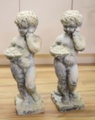 Two reconstituted stone garden cherubs, height 70cm