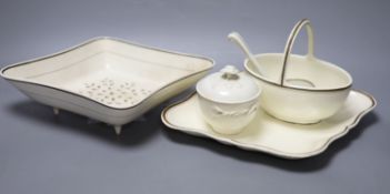 A group of Wedgwood creamware, first half 19th century - a lozenge strainer, similar dish, a cream