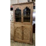 A 19th century Continental pine glazed cabinet, width 112cm, depth 49cm, height 214cm