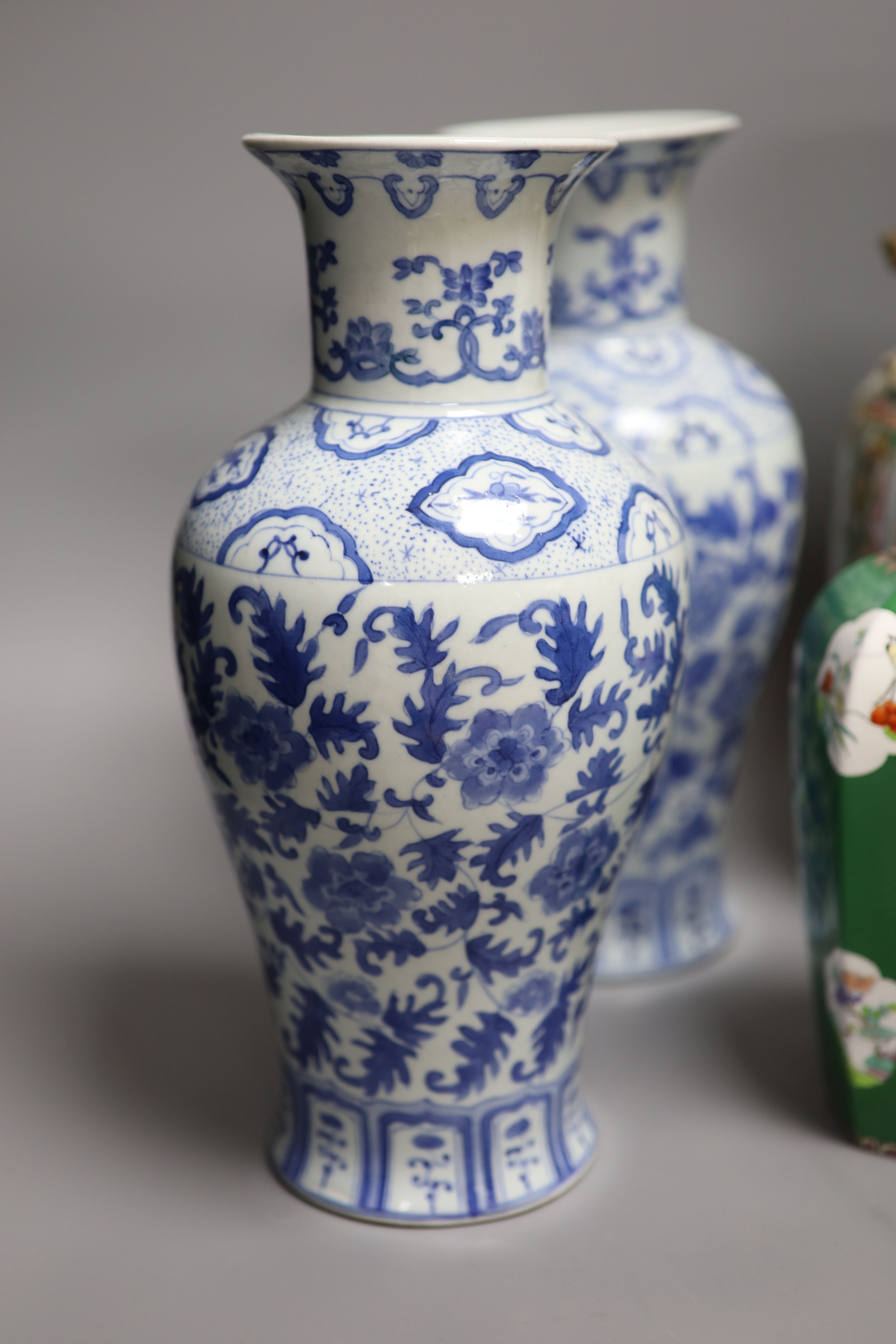 A Chinese famille rose Canton vase, a pair of blue and white vases and two others, tallest 35. - Image 2 of 7