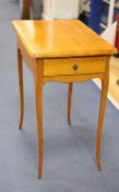 A 19th century Biedermeier cherrywood side table, fitted with a single drawer, raised on cabriole