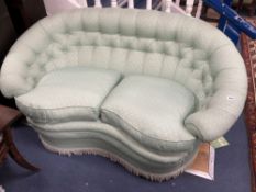 A tub framed two seater settee upholstered in patterned pale green fabric, length 150cm, depth 80cm,