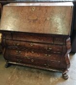 An 18th century Dutch floral marquetry walnut bombe bureau, width 120cm, depth 58cm, height 106cm