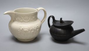A Wedgwood basalt teapot and cover, c.1800 and a Turner, Lane End white stoneware jug, tallest 13.