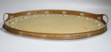 A Newlyn embossed copper oval two handled tray, length 47.5cm