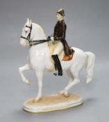 An Augarten porcelain Spanish Riding School equestrian group, height 25cm