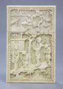 A 19th century Cantonese export carved ivory card case decorated with figures below leafy