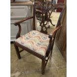 A George III mahogany elbow chair