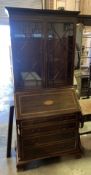 An inlaid mahogany bureau bookcase, width 95cm, depth 54cm, height 207cmCONDITION: Reproduction -