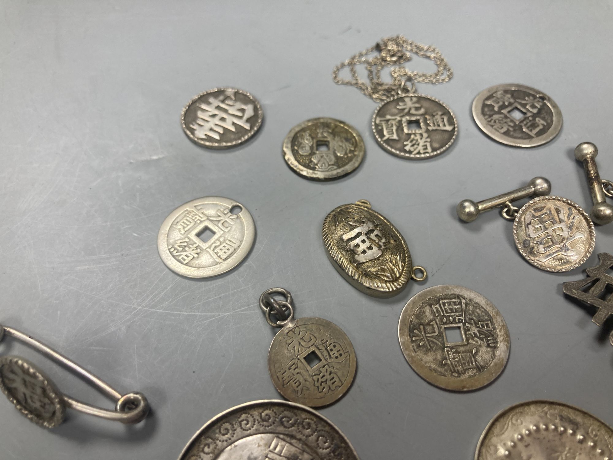 China, a group of silver and white metal coin charms, brooches and cuff links, Guangxu to Republic - Image 4 of 5