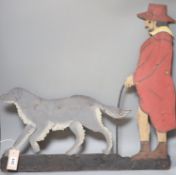 A 19th century painted weather vane of a man and his dog