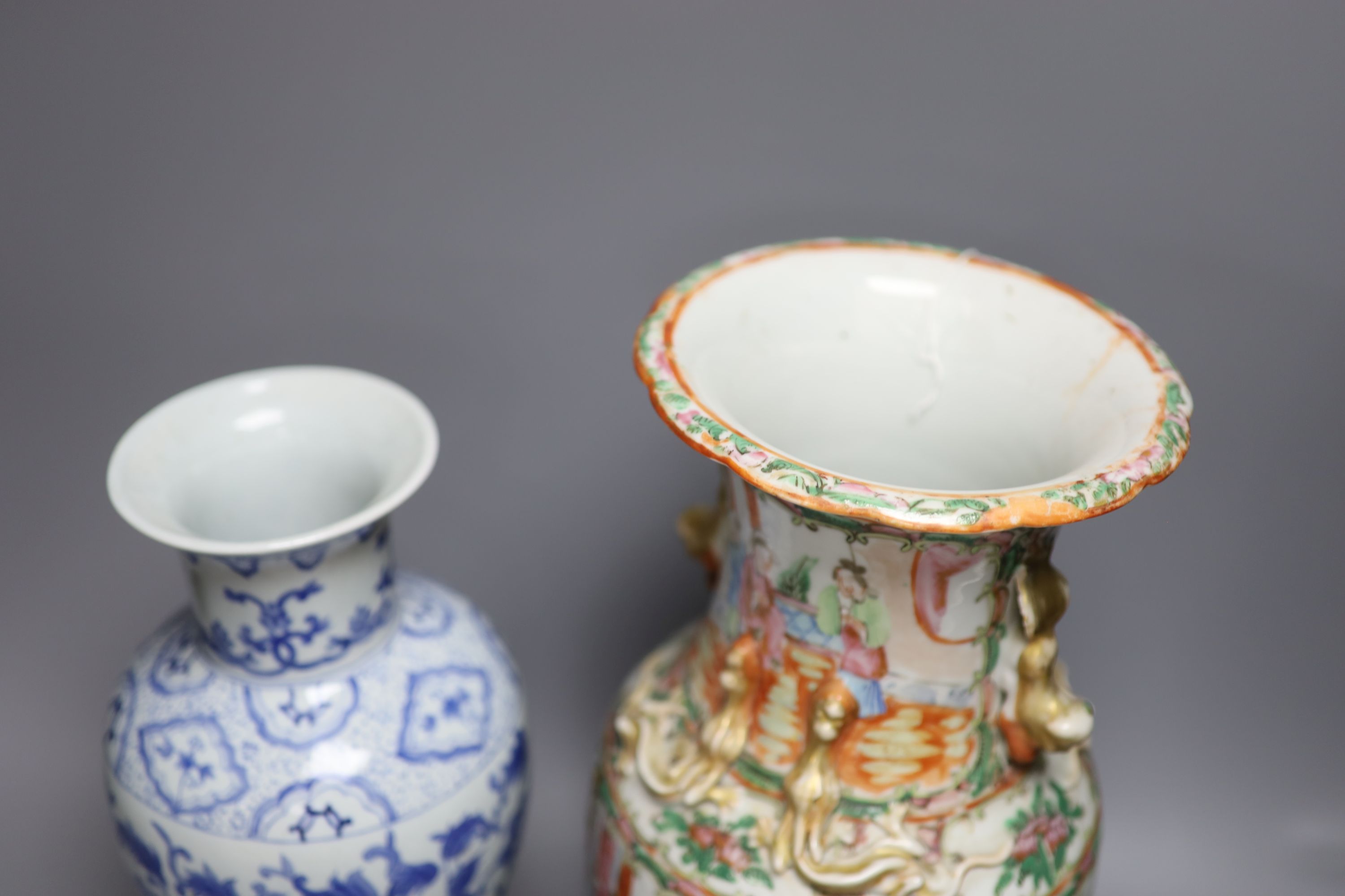 A Chinese famille rose Canton vase, a pair of blue and white vases and two others, tallest 35. - Image 6 of 7