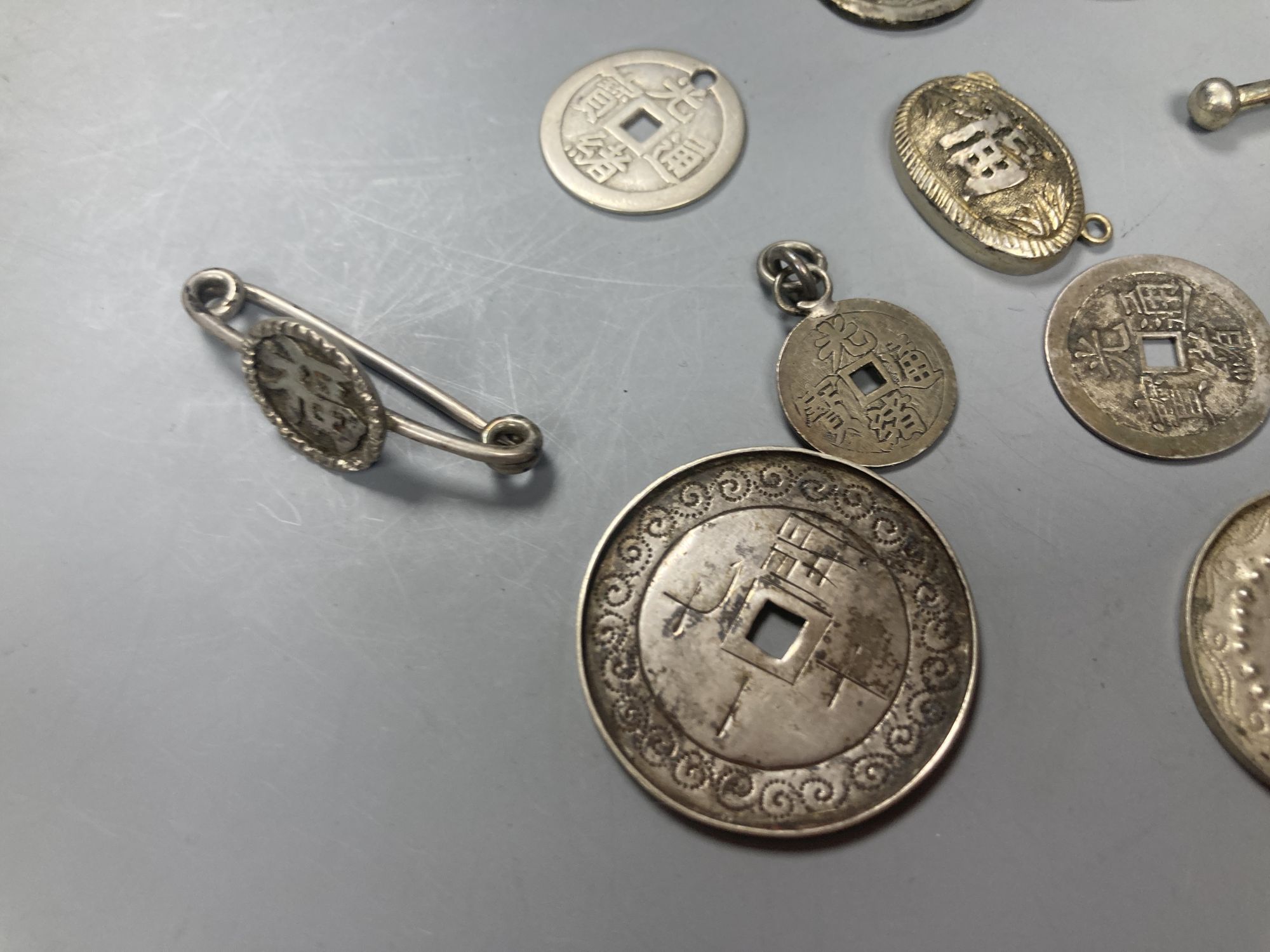 China, a group of silver and white metal coin charms, brooches and cuff links, Guangxu to Republic - Image 3 of 5