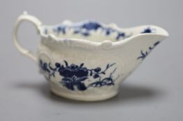 An 18th century Worcester 'two porter ' pattern cream boat, crescent mark, length 14cm