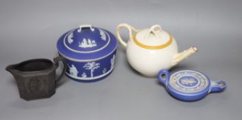 A Wedgwood blue jasper butter dish and cover, an oil lamp, a basalt jug and a Queensware teapot (4)