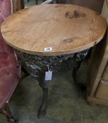 A Victorian cast iron pine top tavern table, 67cm diameter, height 72cm