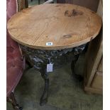 A Victorian cast iron pine top tavern table, 67cm diameter, height 72cm