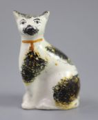 A Staffordshire pottery cat with yellow collar, mid 19th century, height 9.5cmCONDITION: Provenance: