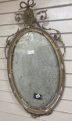 An oval giltwood and gesso wall mirror, width 50cm, height 92cm