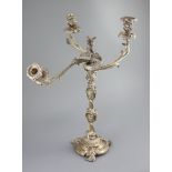 An ornate George III silver three branch, three light candelabrum, by Samuel Roberts, George
