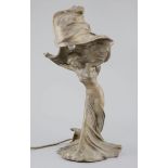 After Raoul Larche (1860-1912). A bronze 'Loie Fuller' table lamp the dancer with raised arms,
