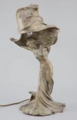 After Raoul Larche (1860-1912). A bronze 'Loie Fuller' table lamp the dancer with raised arms,