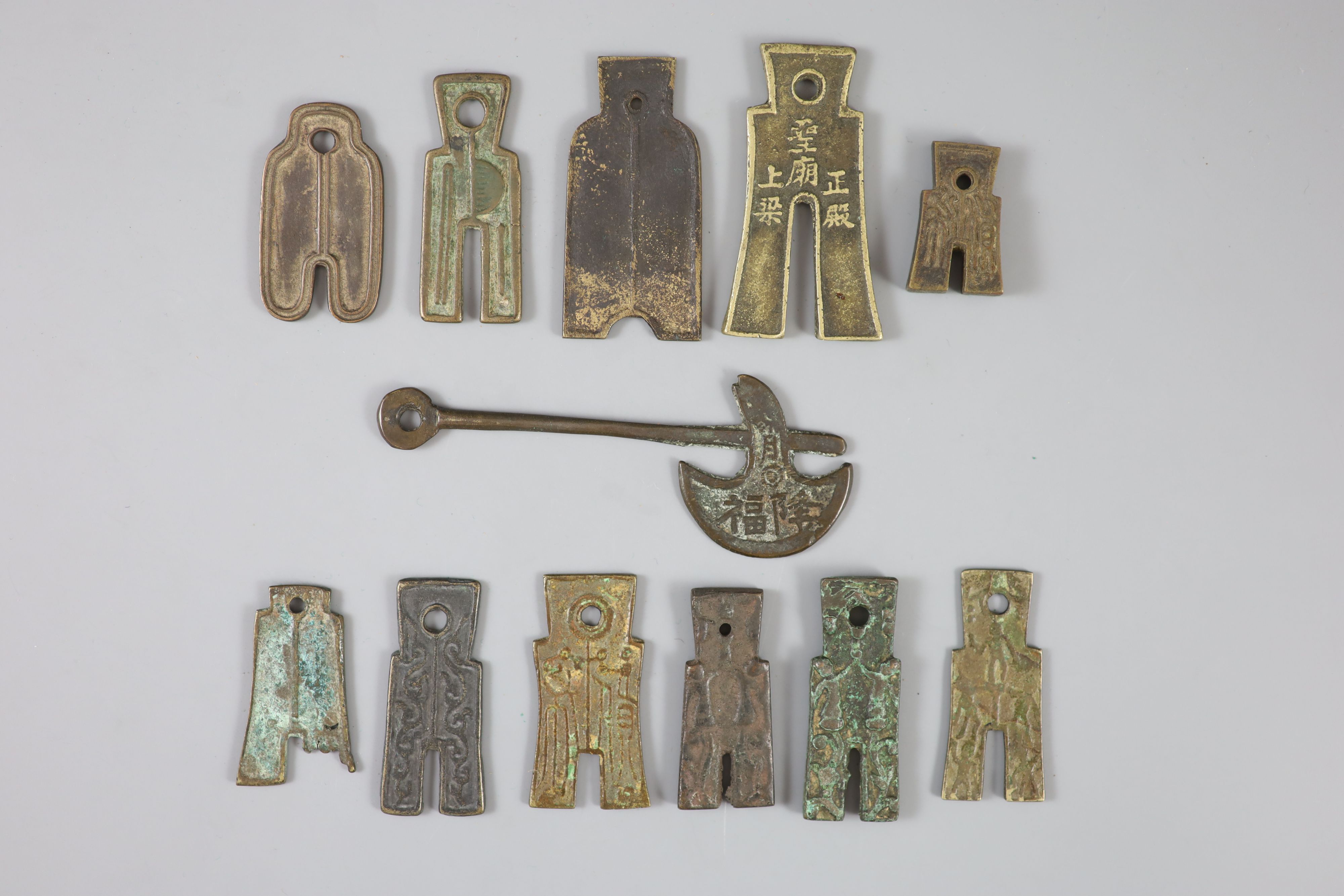 China, 11 bronze spade shaped charms or amulets, Qing dynasty, 31-61mm, F to VF, together with a - Image 4 of 4
