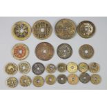 China, 24 bronze charms or amulets, Qing dynasty, two obv. magical spell characters, rev. Eight