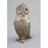 A Victorian silver owl sugar sifter, having chased feather decoration and removable head inset glass