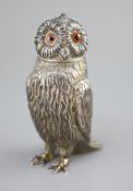 A Victorian silver owl sugar sifter, having chased feather decoration and removable head inset glass