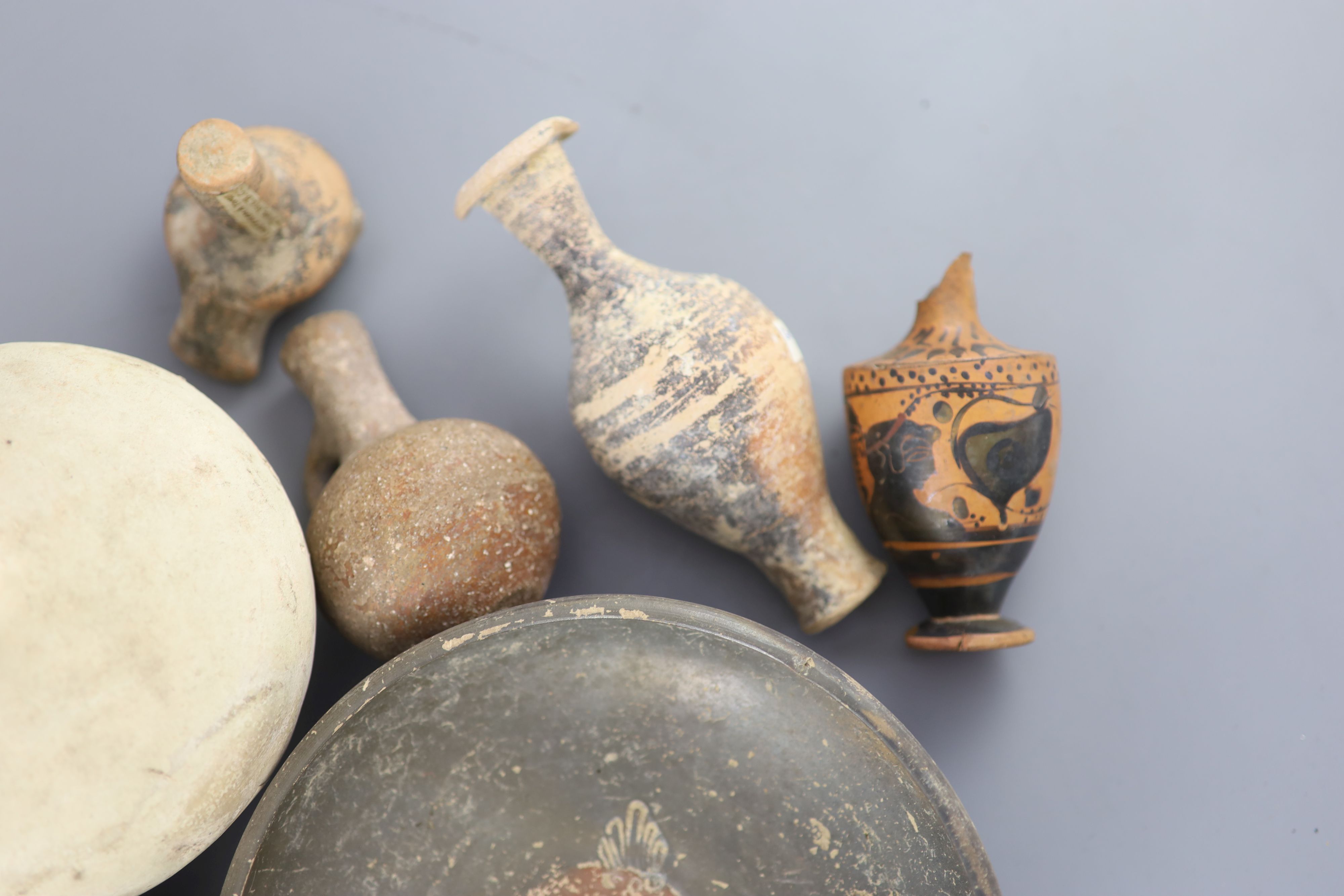 A group of Ancient Greek pottery vessels, Attic and Apulia, 4th-5th century BC, most with old - Image 2 of 7