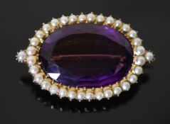 A Victorian style, gold, oval cut amethyst and split pearl cluster set brooch, 48mm, gross 24.3