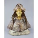 Henry Jacobs. An Art Nouveau gilt bronze bust of a medieval maiden, signed, height 14in., on