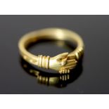 A Victorian 15ct gold Fede ring, size S, 3.6 grams.CONDITION: One of the two shanks appears a little