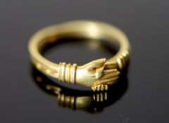A Victorian 15ct gold Fede ring, size S, 3.6 grams.CONDITION: One of the two shanks appears a little