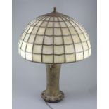 An early 20th century Tiffany style bronze table lamp, by Handel, with opaque leaded glass domed