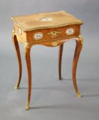 A late 19th century French Louis XV style ormolu kingwood work table, inset with Sevres style